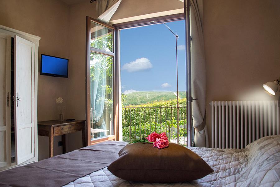 Villa Laura Castellinaldo Pokoj fotografie